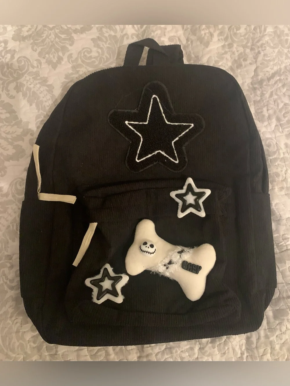 RETEN Black Star Patch Backpack with Plush Bone Accent